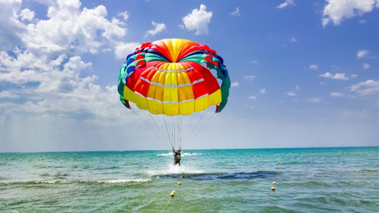 Parasail coming in for landing on shore